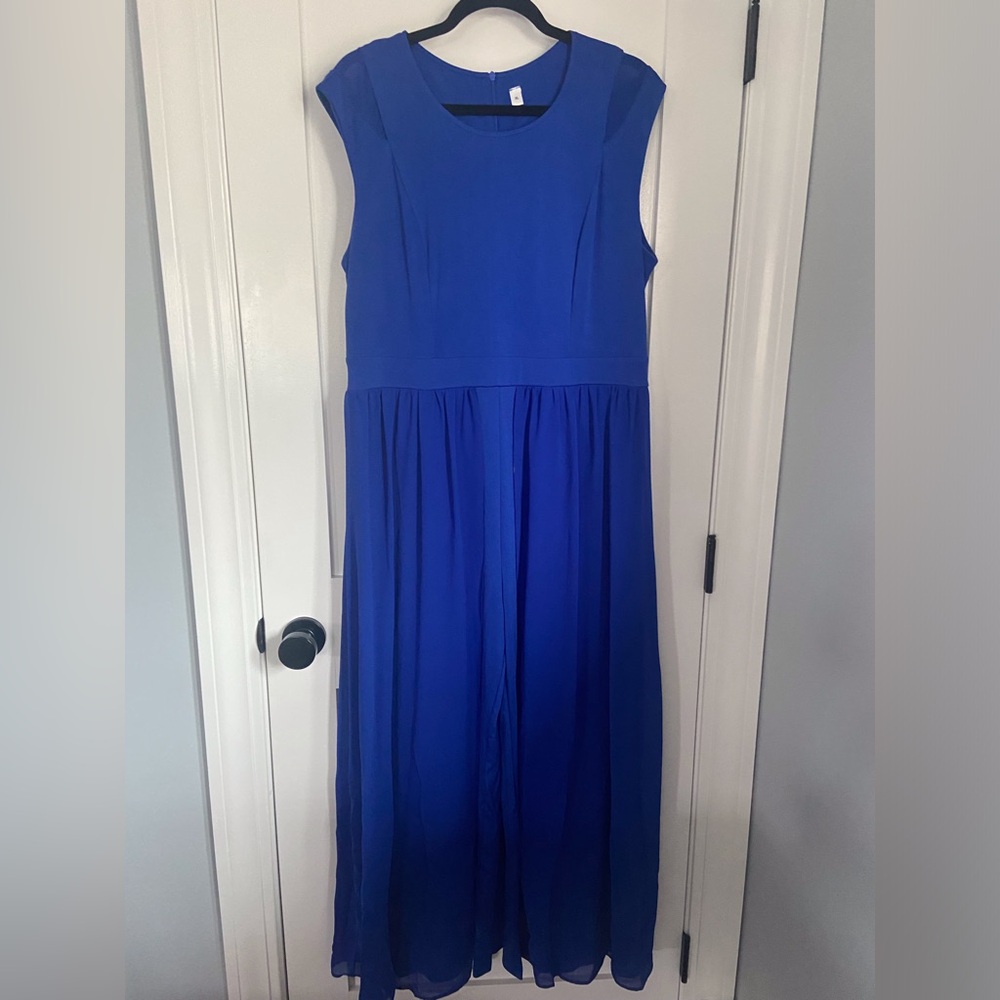 Blue Jumpsuit With An Overlay